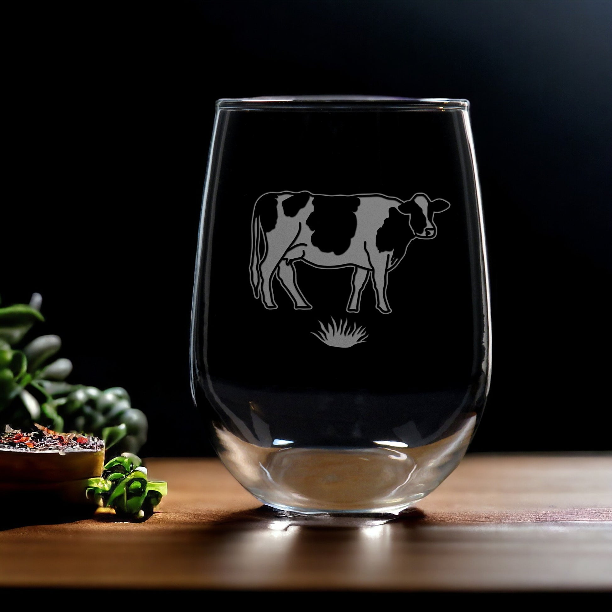 17oz Stemless Wine Glass with a standing cow facing right - Copyright Hues in Glass