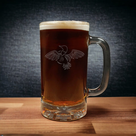 Loon with wings outstretched design on a 16oz handled Beer Mug containing a Dark Beer - Copyright Hues in Glass