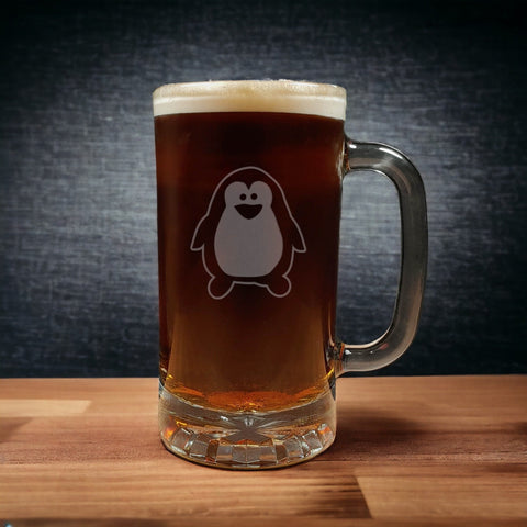 Cute penguin - design 4 - on a 16oz handled Beer Mug containing a Dark Beer - Copyright Hues in Glass