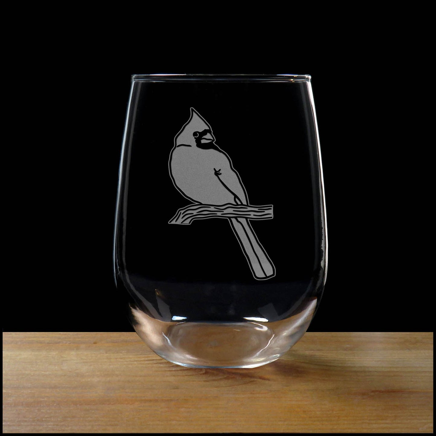 Beautifully etched 17oz stemless wine glass featuring a realistic cardinal design. A perfect personalized gift for bird lovers, nature enthusiasts, or memorial keepsakes.