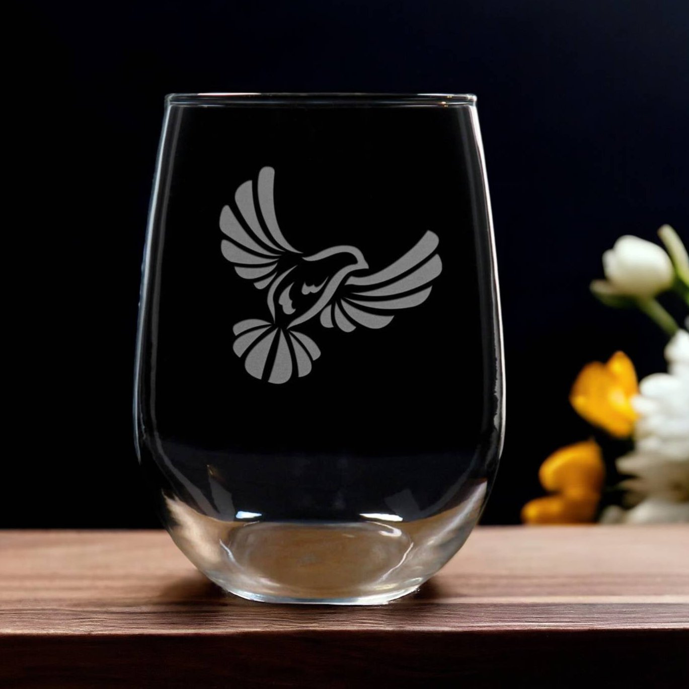 Stemless  wine Glass etched with a flying dove - Copyright Hues in Glass