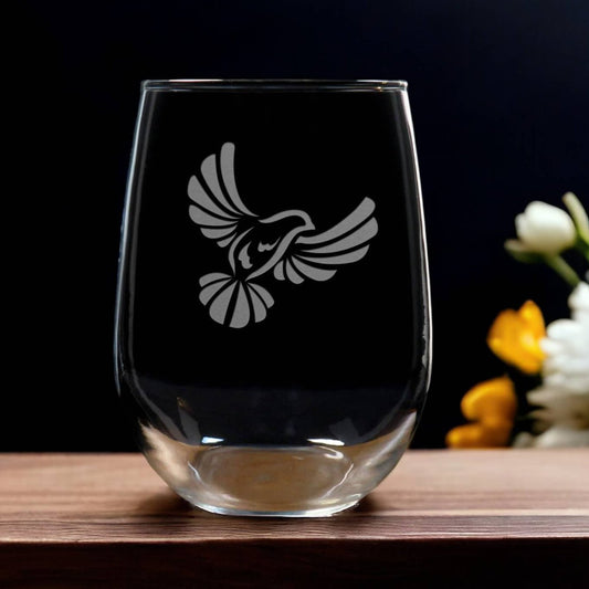 Stemless  wine Glass etched with a flying dove - Copyright Hues in Glass