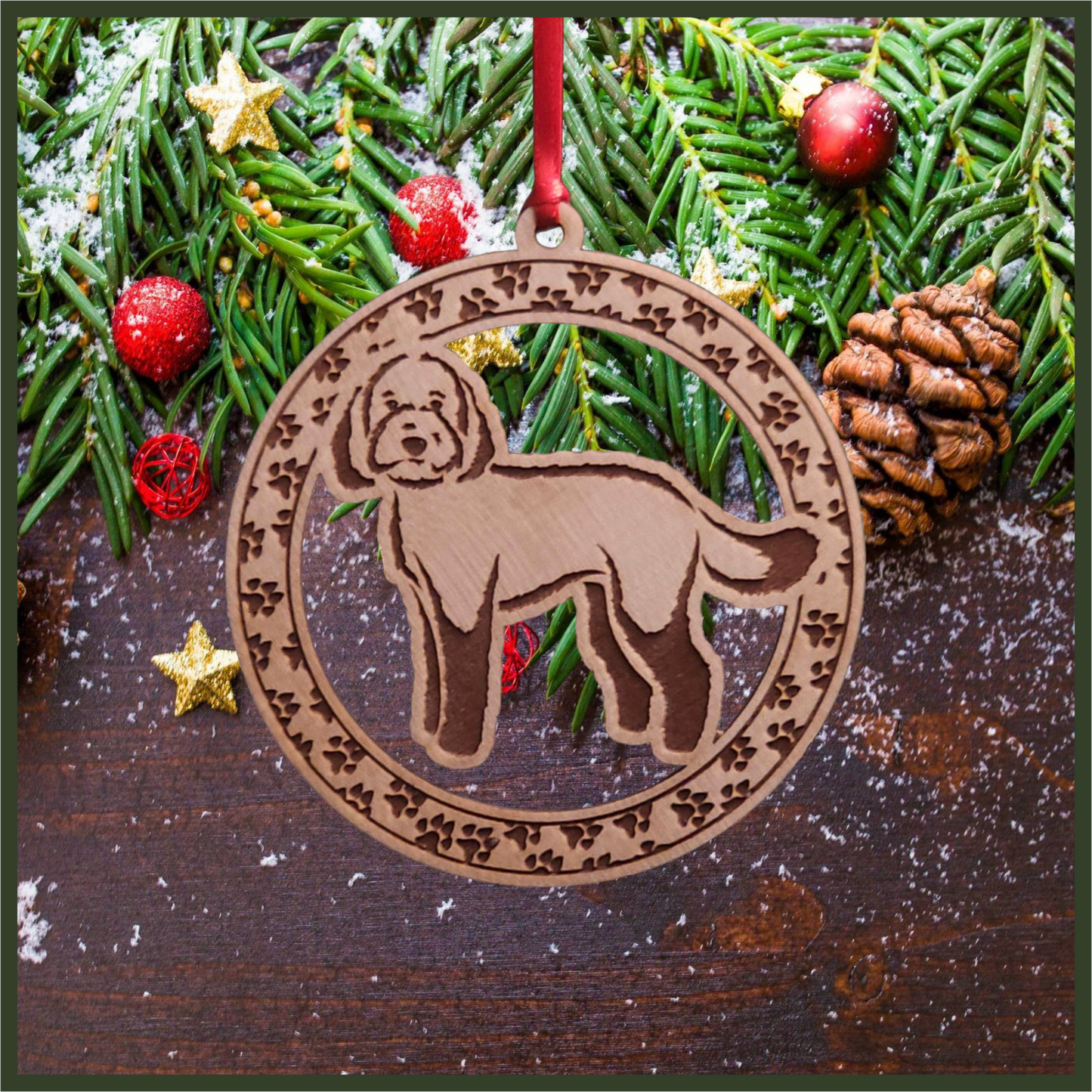 A round maple wood veneer ornament with a border of small paw prints. The center of the ornament is a labradoodle dog