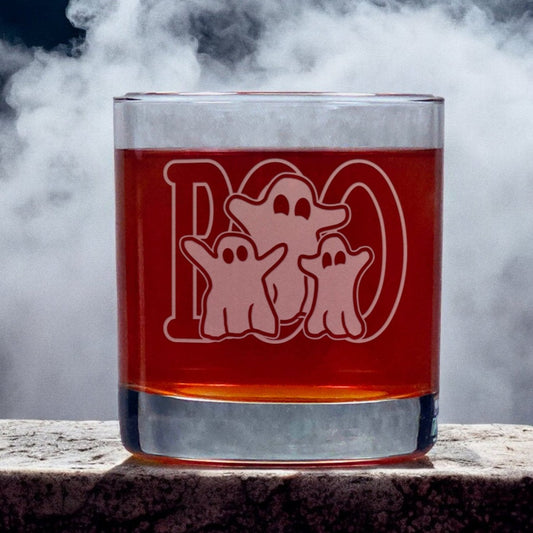 An image of an 11oz whiskey glass three ghosts standing in front of a large word "BOO"