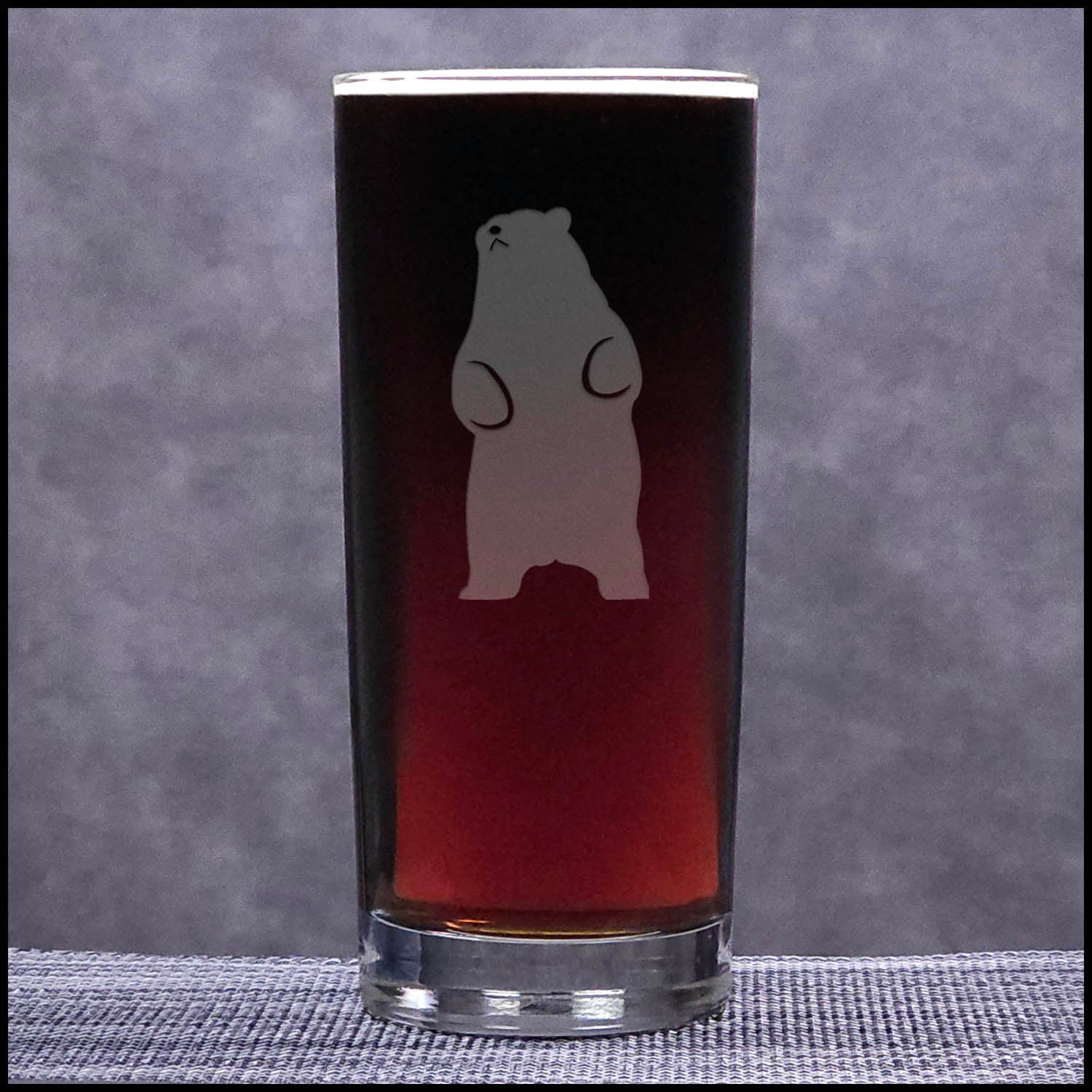 A 15.75oz Cooler Glass with an etched Bear Standing on hind legs on it - Copyright Hues in Glass