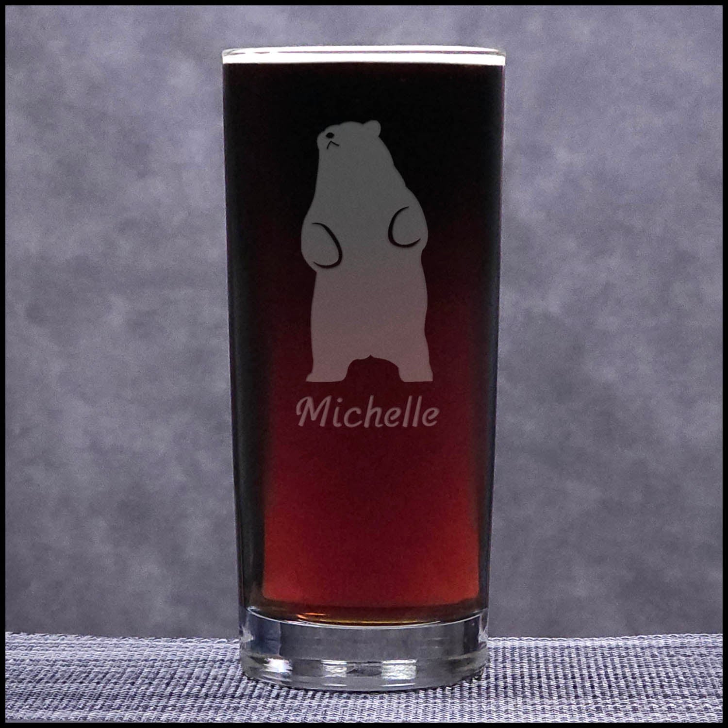 A 15.75oz Cooler Glass with an etched Bear Standing on hind legs and Personalization - Copyright Hues in Glass