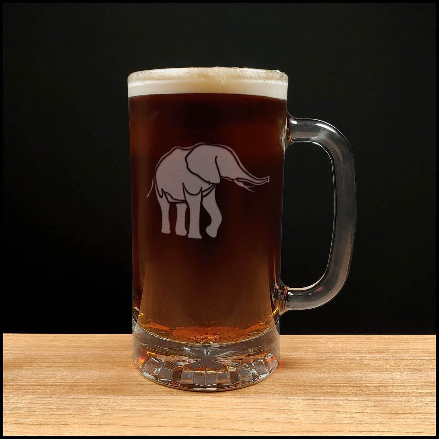 Elephant Beer Mug wit a Deeply etched with sandblasting for a permanent finish, perfect for animal lover gifts or safari themed barware.Copyright Hues in Glass