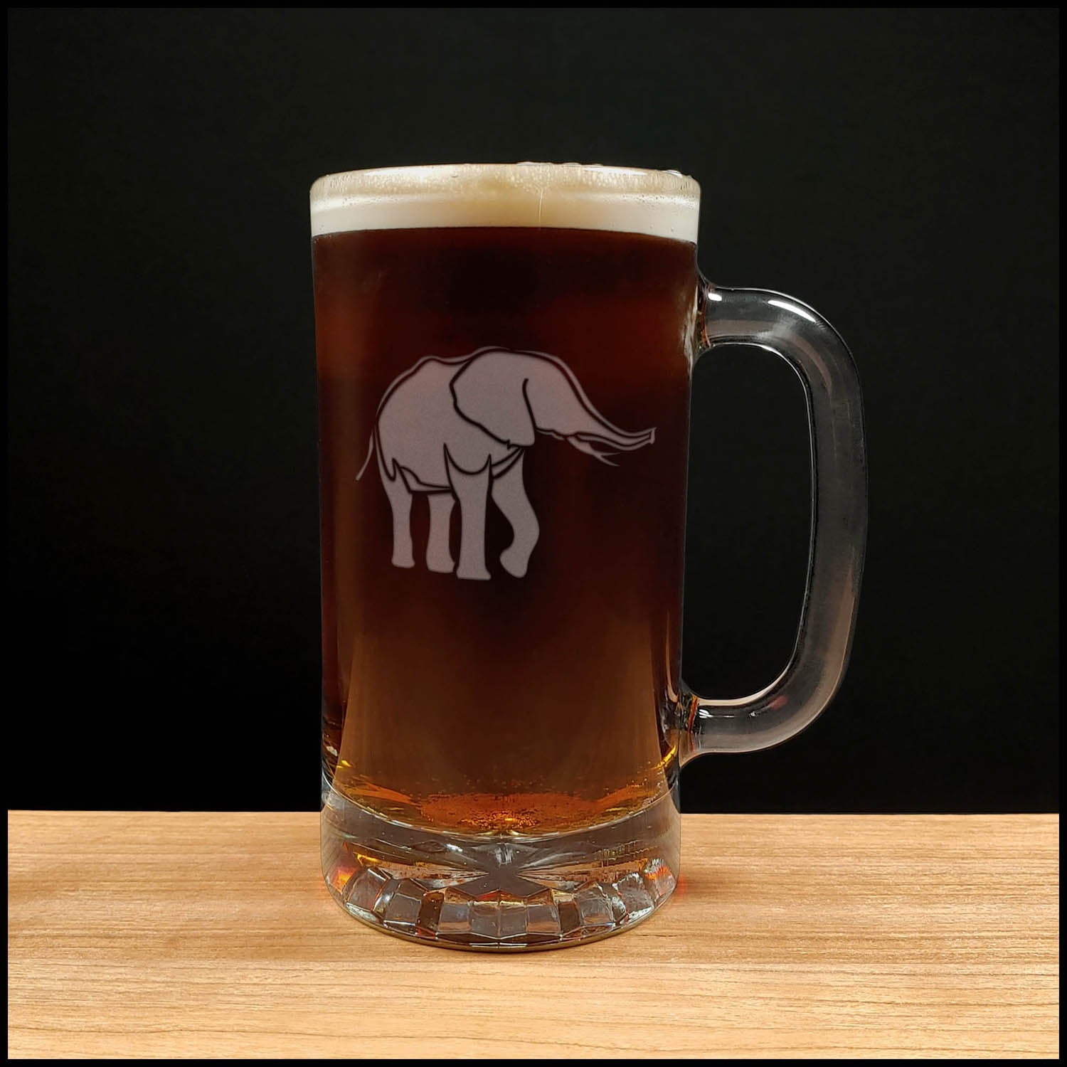 Elephant Beer Mug wit a Deeply etched with sandblasting for a permanent finish, perfect for animal lover gifts or safari themed barware.Copyright Hues in Glass