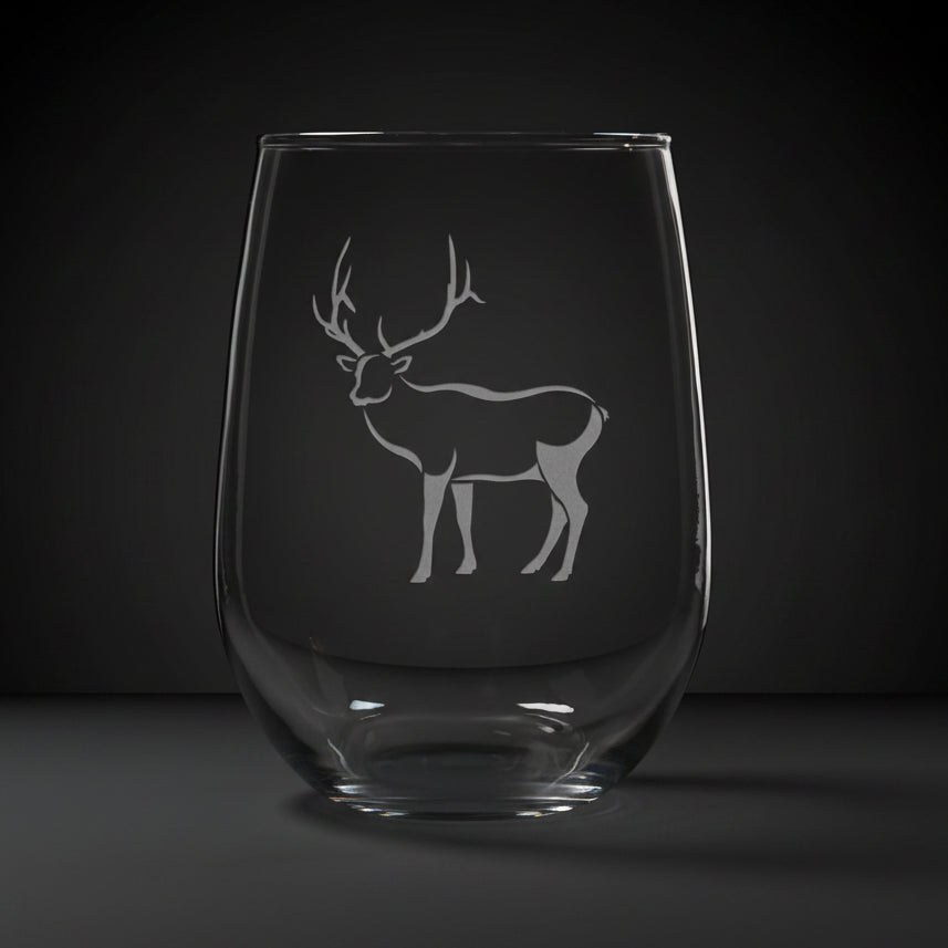 17oz Stemless Wine Glass with an etched image of a elk, on a wood surface and a black background