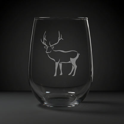 17oz Stemless Wine Glass with an etched image of a elk, on a wood surface and a black background