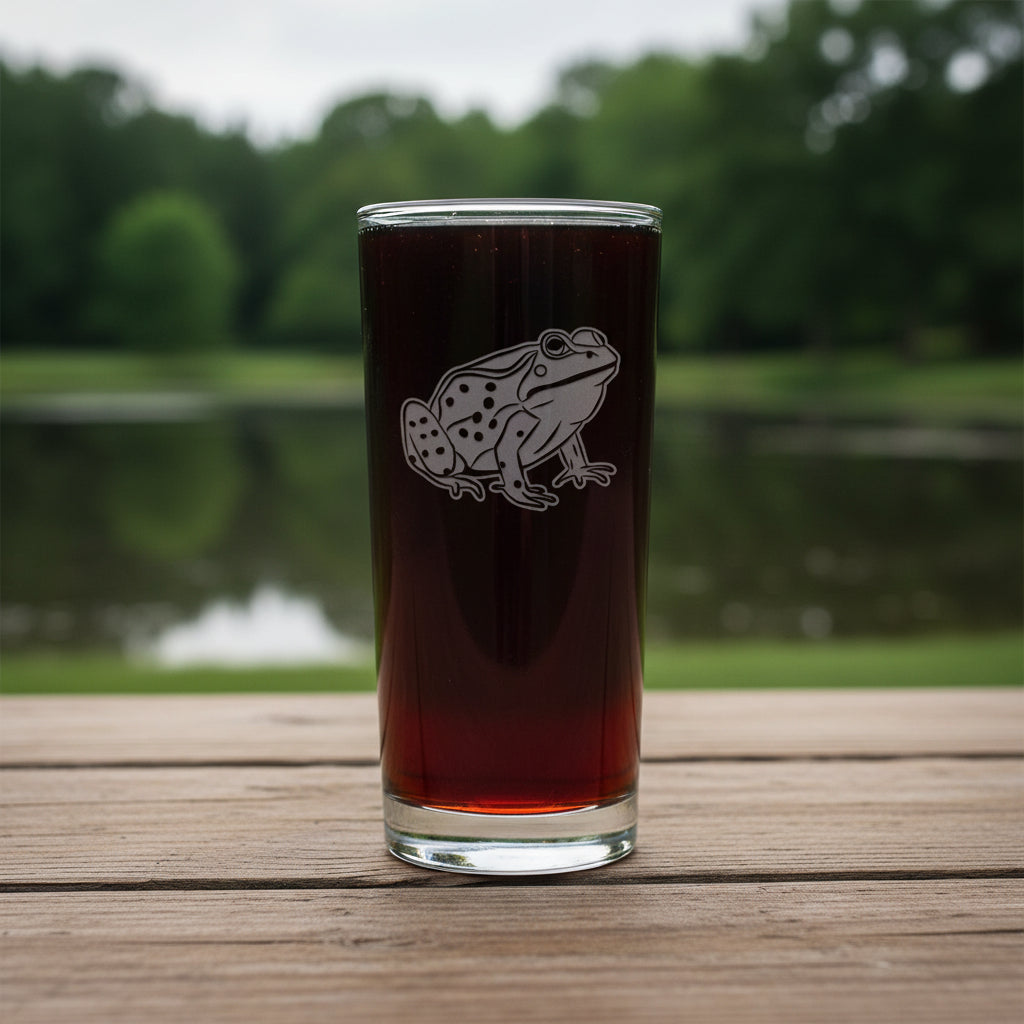 15oz Cooler  Glass with an etched image of a frog  with a pond  in the  background