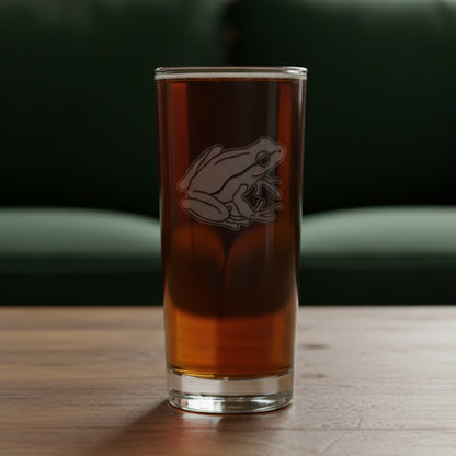 15oz Cooler Glass with an etched image of a garden frog 
and a green couch in the background