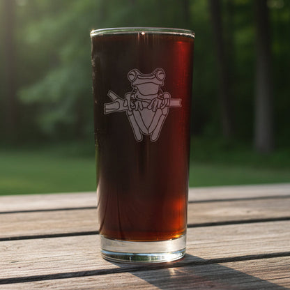 15oz Cooler  Glass with an etched image of a tree frog  with trees in the  background