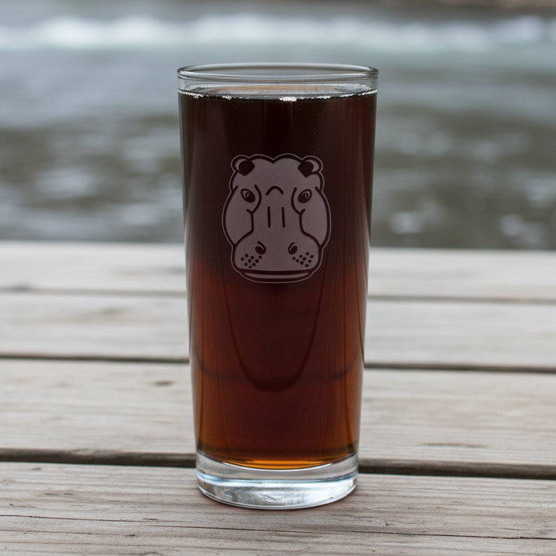 15oz Cooler  Glass with an etched image of a hippo face with a background of a river