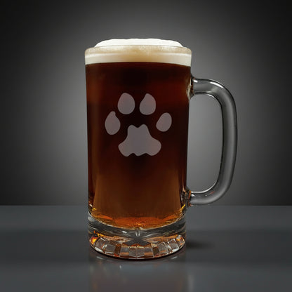 16oz Beer Mug with an etched image of a cougar track a grey  background