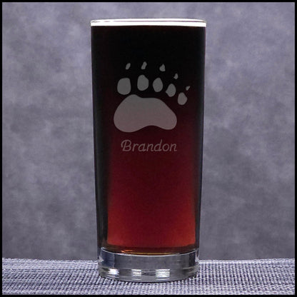 A 15.75oz Cooler Glass with an etched Bear Track and Personalization - Copyright Hues in Glass