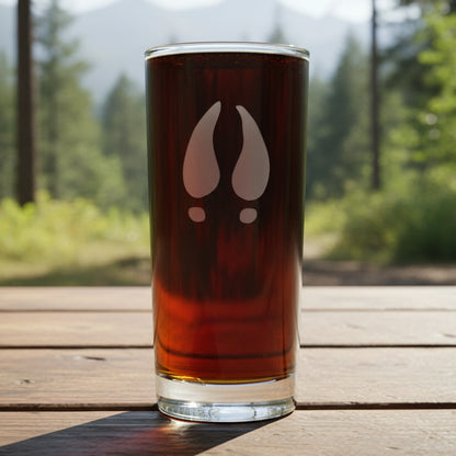 A 15.75oz Cooler Glass with an etched Deer Track on it - Copyright Hues in Glass