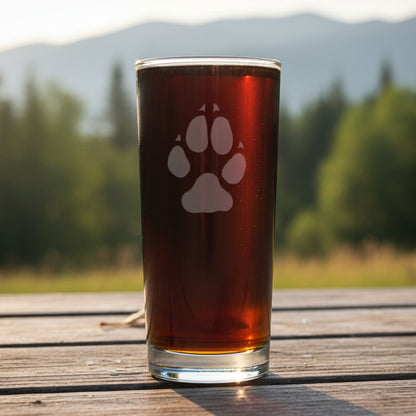 A 15.75oz Cooler Glass with an etched Wolf Track on it - Copyright Hues in Glass