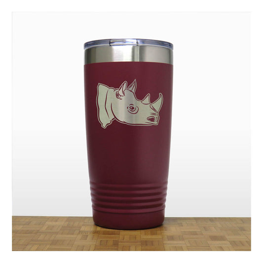 Maroon tumbler with rhino design on a white background