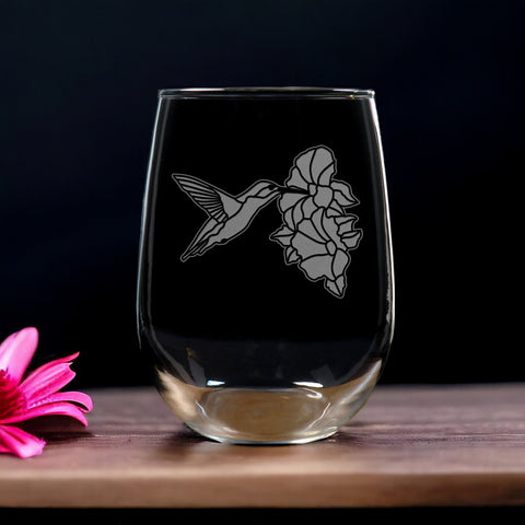 Hummingbird sipping form a Hibiscus Stemless Wine Glass - Copyright Hues in Glass