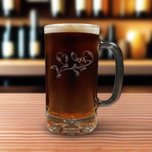 Love birds on a branch on a 16oz handled Beer Mug containing a Dark Beer - Copyright Hues in Glass