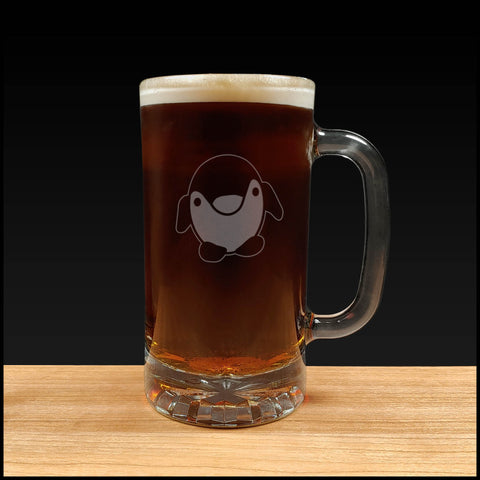 Cute penguin - design 2 - on a 16oz handled Beer Mug containing a Dark Beer - Copyright Hues in Glass