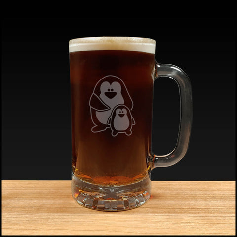 Cute penguin and Baby  - design 2 - on a 16oz handled Beer Mug containing a Dark Beer - Copyright Hues in Glass