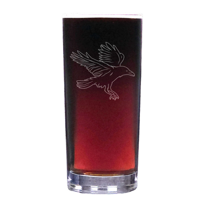 Black glass with a bird engraving on a white background