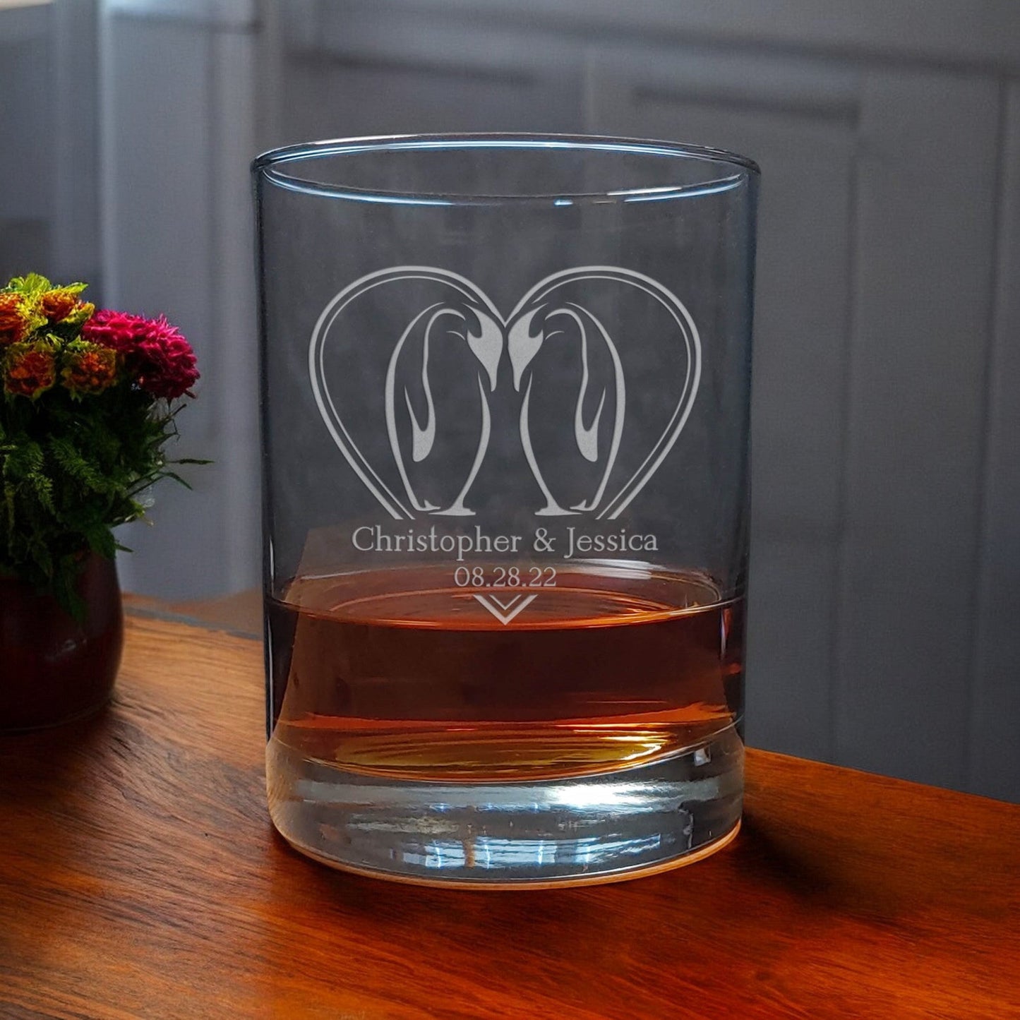 A pair of Kissing Penguins in a Heart 13oz Whisky Glass -  Copyright Hues in Glass