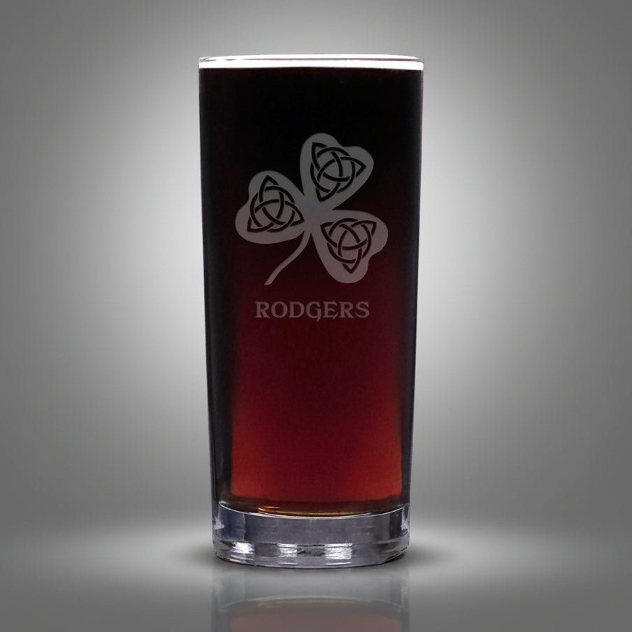 Black glass with engraved clover design and 'RODGERS' text on a gray background