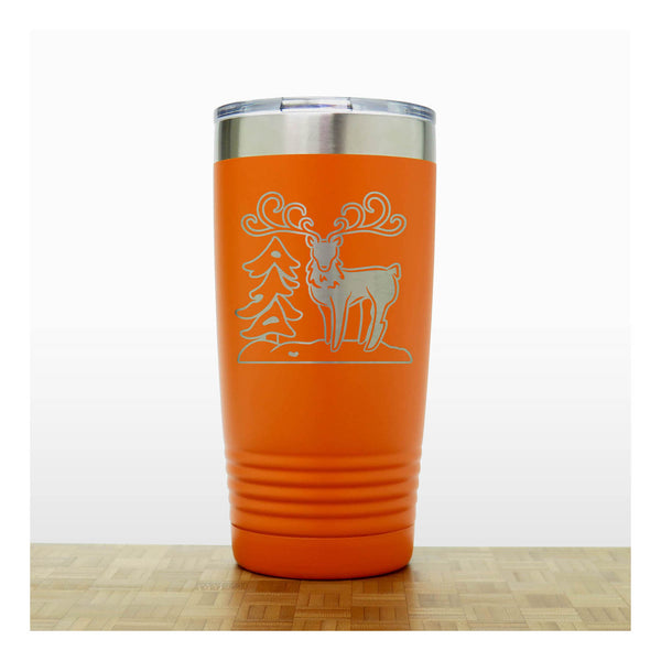 Orange - Insulated Travel Mug with the design of a Reindeer sta nding beside a Christmas tree - Copyright Hues in Glass