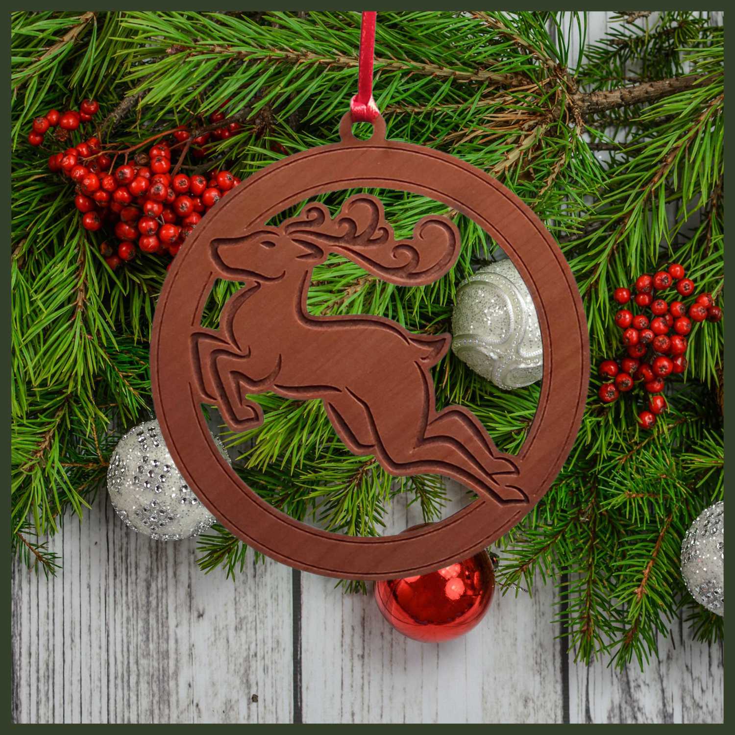 Leaping Reindeer wood cherry veneer ornament - Copyright Hues in Glass  