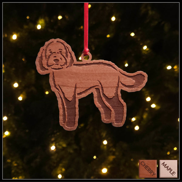 A Labradoodle cherry wood veneer ornament, with the dog in profile.