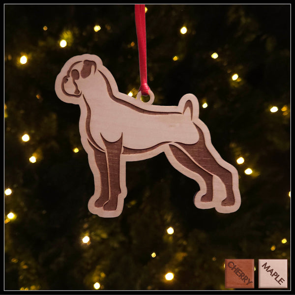A Boxer dog maple wood veneer ornament, with the dog in profile. 