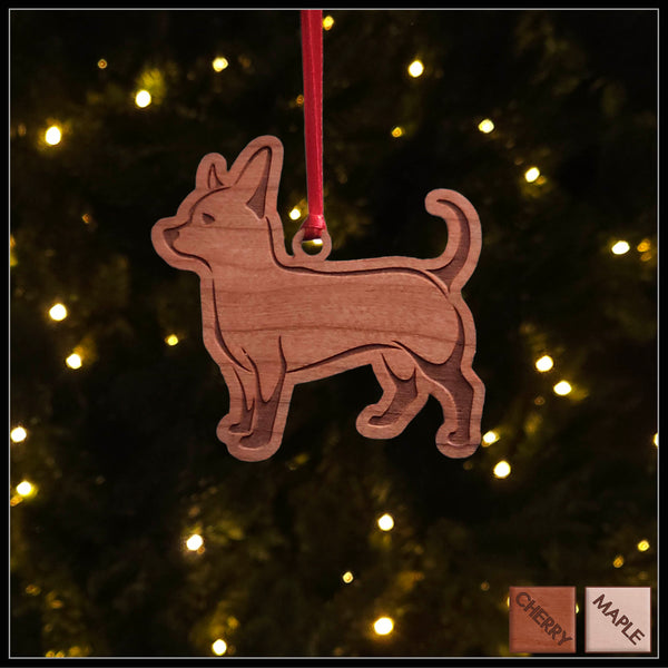 A Chihuahua cherry wood veneer ornament, with the dog in profile. 
