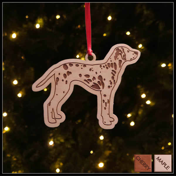 A Dalmation maple wood veneer ornament, with the dog in profile. 