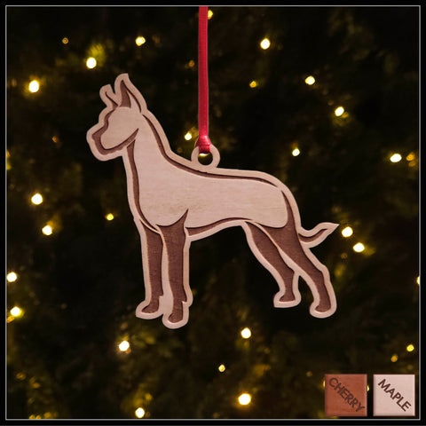 A Great Dane maple wood veneer ornament, with the dog in profile. 