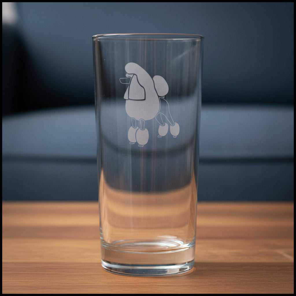 15oz Cooler Glass with an etched poodle with a blue couch in the background.