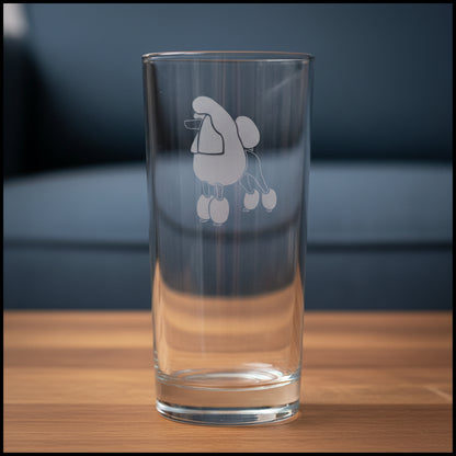 15oz Cooler Glass with an etched poodle with a blue couch in the background.