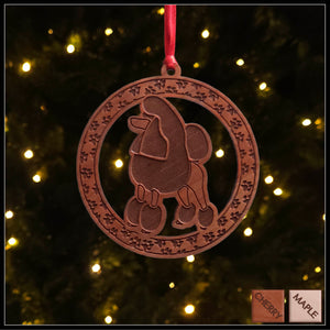 A round cherry wood veneer ornament with a border of small paw prints. The center of the ornament is a Poodle dog.