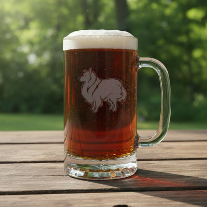 Etched Sheltie design on a beer glass with a handle with trees in the background