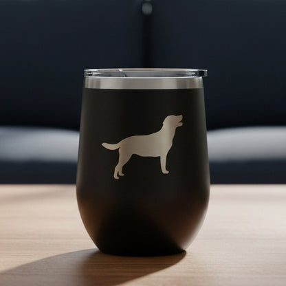 Laser Engraved Goldendoodle design on a 12oz insulated wine tumbler with a with a blue couch in the background