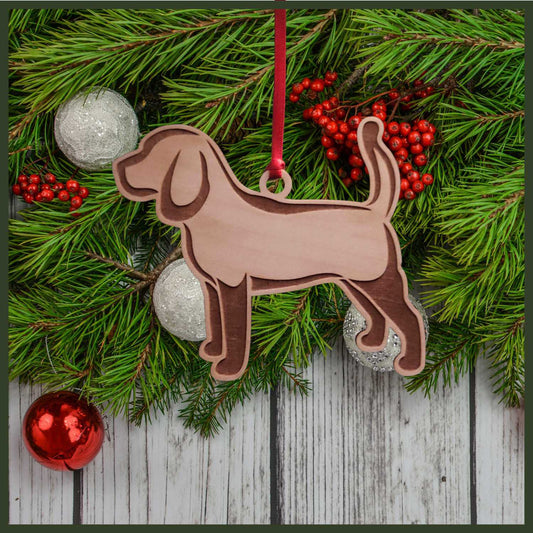 A Beagle maple wood veneer ornament, with the dog in profile. 