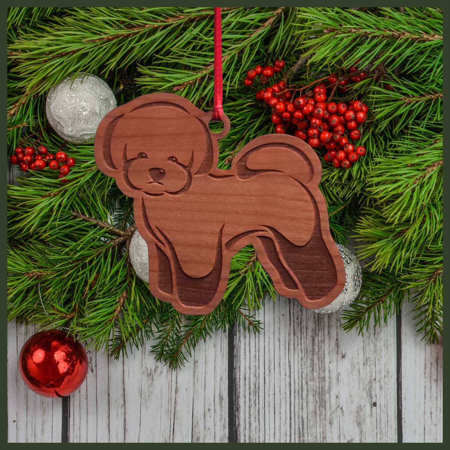 A Bichon Frisé cherry wood veneer ornament, with the dog in profile. 