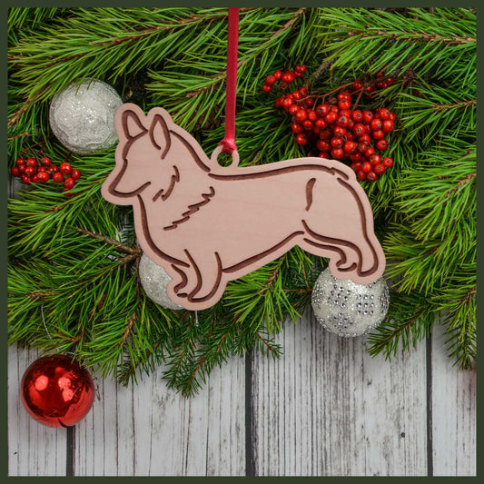 A Corgi maple wood veneer ornament, with the dog in profile. 