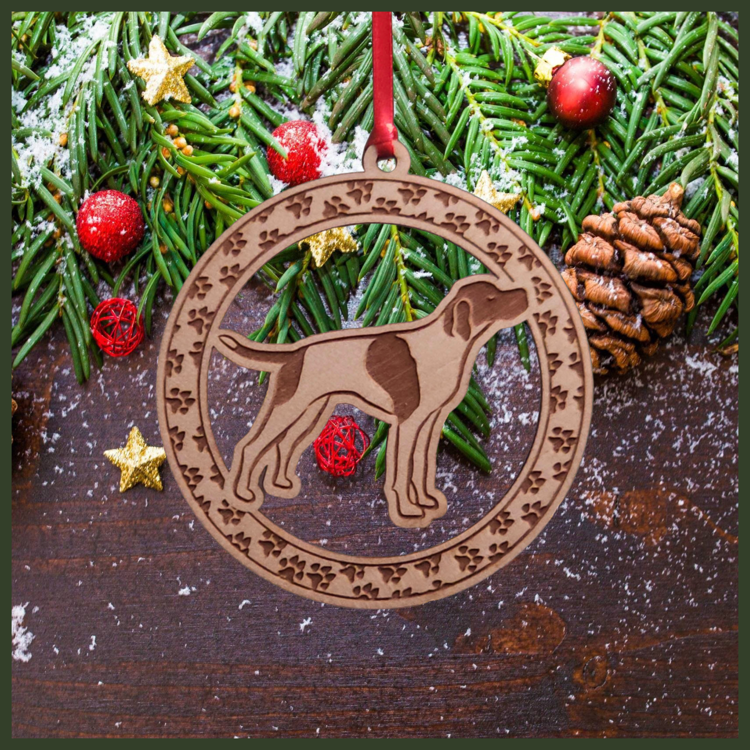 A round Maple wood veneer ornament with a border of small paw prints. The center of the ornament is a English Pointerdog.