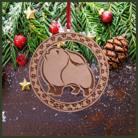 A round Maple wood veneer ornament with a border of small paw prints. The center of the ornament is a Pomeranian dog.
