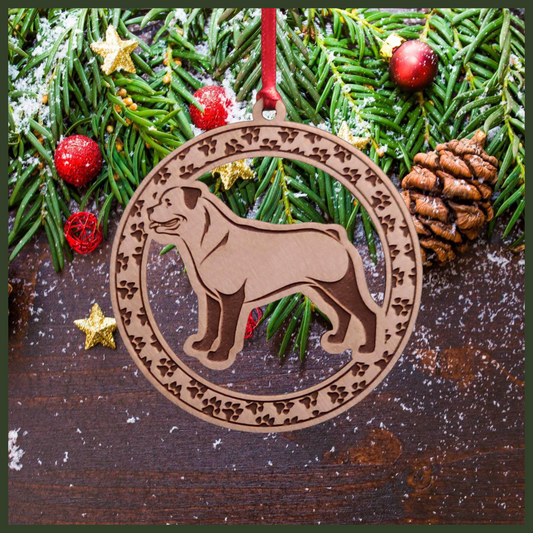 A round Maple wood veneer ornament with a border of small paw prints. The center of the ornament is a Rottweiler dog.