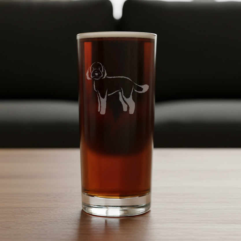Etched Labradoodle  design on a cooler glass with a black couch in the background