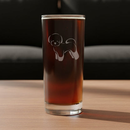Coooler glass with aBichon Frise dog design with a black couch in the  background